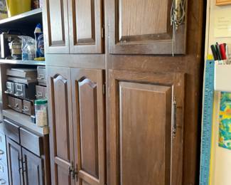 Cabinets in garage used for storage, are for sale