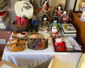 Japanese items from travel, plus wooden shoes and (?) fur Tibetan shoes