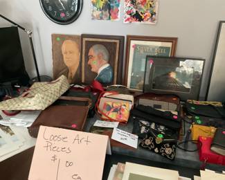 Smaller unframed art pieces and student art 1.00 ea. other collectible items in background, women’s bags