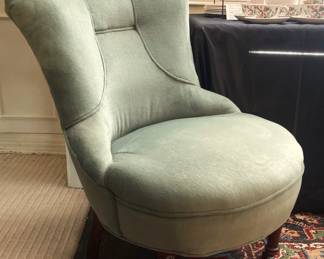 ONe of two vintage pale green chairs