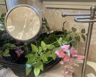 Magnifying mirror; hand towel holder