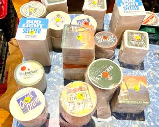 Assorted branded bar coasters