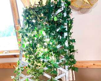 wooden trellis displaying vines