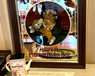 Numerous bar mirrors and advertisments