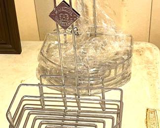 A case of "Tabasco" condiment holders.  The case holds about 15