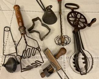 Fun antique kitchen tools: masher, ice conical ice cream scoop, antique egg beaters, nutmeg grinder 
