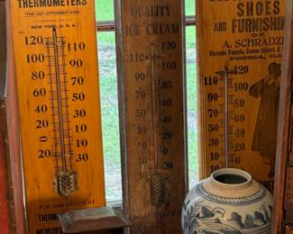 Just three of the fifteen antique advertising wall thermometers. An antique tin from the mid 1800’s. Chinese blue and white. 