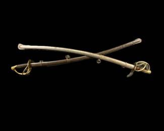 Two Sabers with Sheaths by N. P. Ames.  One Model 1840 Cavalry Saber Dated 1845, and one Model 1840 Light Artillery Saber Dated 1863.  Excellent condition. Each approximately 42 inches long.