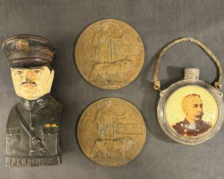 General Pershing antique figural cast iron bank, bronze WWI memorial death plaques, Admiral Dewey ‘Remember The Maine’ reverse painted glass canteen. 