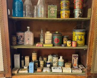 Antique and Victorian era apothecary, peanut butter pail tins, snuff and tobacco tins, antique milk bottles. 