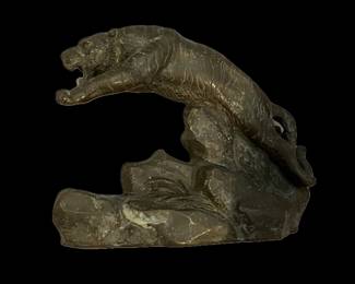 One of a pair of small solid bronze sculptures of tigers, unmarked