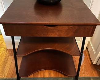 Side table on rollers and a drawer