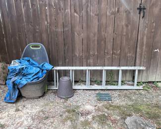 Wheel barrel, extension ladder 

Owner took black wheelbarrow ****