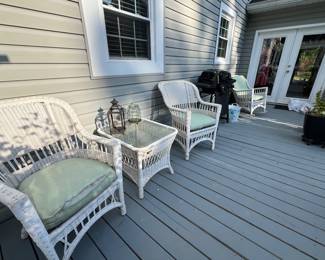 Several nice outdoor metal frame wicker looking outdoor chairs 