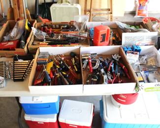 Variety of tools, wrenches, and screwdrivers.