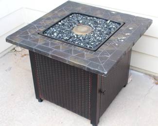 Fire pit with glass surround.