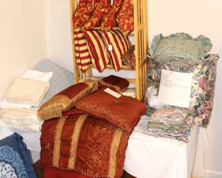 Comforters, blankets and decorator pillows.