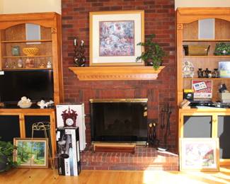 In the family room we have lots of electronics, new in box items, paintings, prints and home decor.