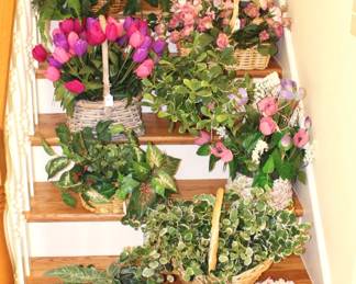 We've lined the stairs with beautiful silk flower arrangements.  