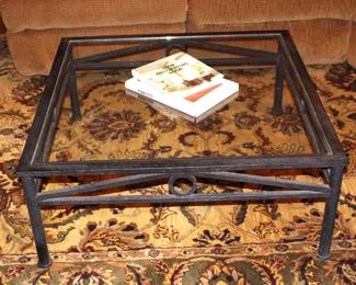 Glass top, iron base coffee table. $125.00.                          40" Sq. x 16 3/4" H.