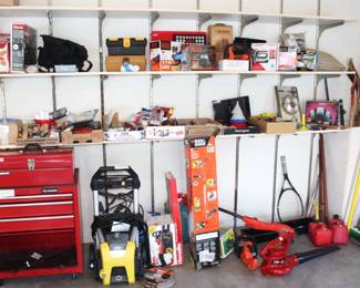 Husky tool cabinet, newer electric power washer, electric chain saw, Black and Decker weed wacker, variety of extendable poles, misc. items.