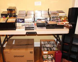 Large assortment of cd's, dvd's, cassettes.