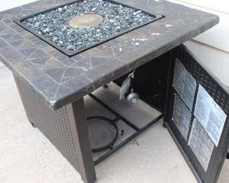 Fire pit with glass surround.