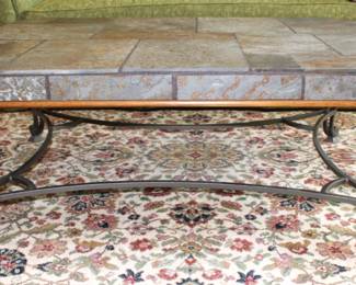 BUY IT NOW!  $295.00.  Coffee table, iron base, slate top with oak trim.  36" W x 48" L  x 19" H.