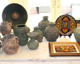 Lots of pottery pieces.