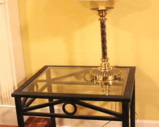 Glass top, iron base end table. $75.00.                                   22" D x 27" W x 22 1/2" H.