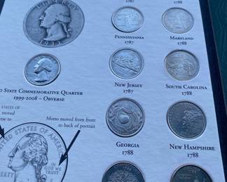 State Quarter Books with One Silver Quarter in Each Book