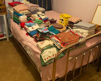 Brass Bed with Linens and Bedding