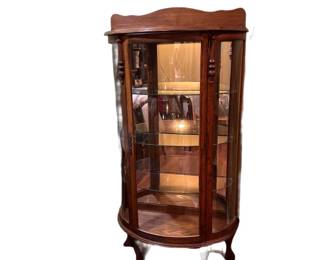 Antique curved curio cabinet 
