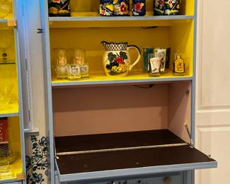 Opens to a desk. Shut and hide it !’