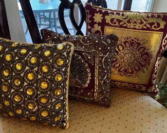 Gold trimmed pillows