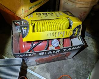 5 gallon air tank, and new hose.