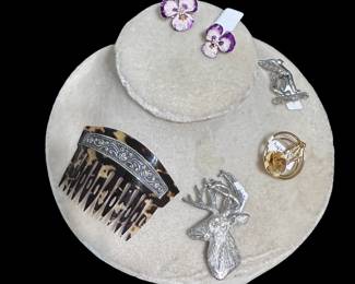 Silver trimmed hair comb and costume jewelry