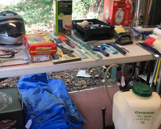 Various painting tools, sprayers, and Tarp.