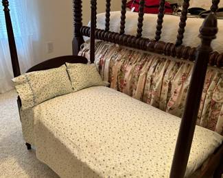 Postered doll's bed