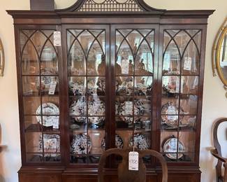 Baker flame mahogany china cabinet, mid 20th c.