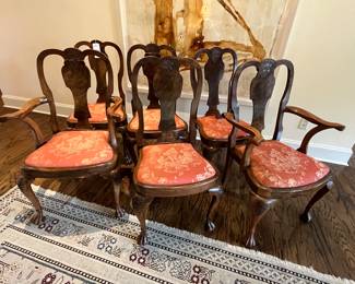 An amazing set of 6 Georgian Carved Mahogany Dining Chairs, 2 arm and four sides, featuring a nice baluster shaped splat over floral carved crest rail, on carved claw feet. 