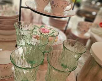 Slender green glass wirh pink.feet