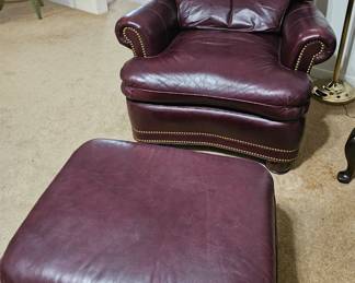 Two leather chairs and ottoman available, one chair is sold as is
