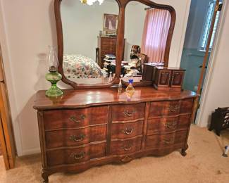 classy dresser with stunning mirror and lots of storage