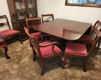 Antique drop leaf table with 3 leaves 6 chairs