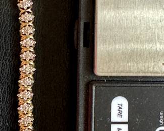 #155 - $200 10kt gold & CZ diamonds - 9.25gr
