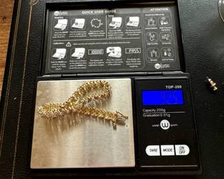 #155 - $200 10kt gold & CZ diamonds - 9.25gr