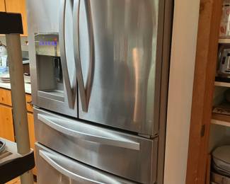 #84 - $800 Whirlpool Stainless Refrigerator