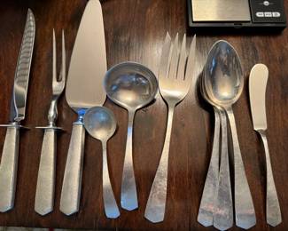 #31 - $1,500 Sterling set of flatware "Martele" - J.S & Co (Joseph Seymour)   Total 80 pieces - 74.79 oz -12 dinner knifes - 12 dinner forks and 12 dessert/salad , 12 teaspoons - 12 butter spreaders - 12 apetizer forks, 8 serving pieces. 