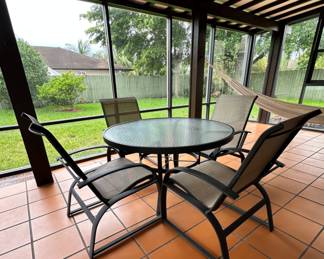 Dining set, table w/ 4 chairs. Practically new, has never been exposed to sun or rain, always kept indoors. 